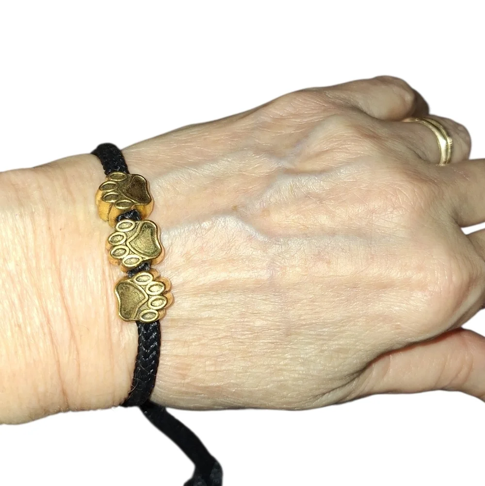Gold Toned BEAR PAW Beaded BLACK Cord Pull Style BRACELET Unisex